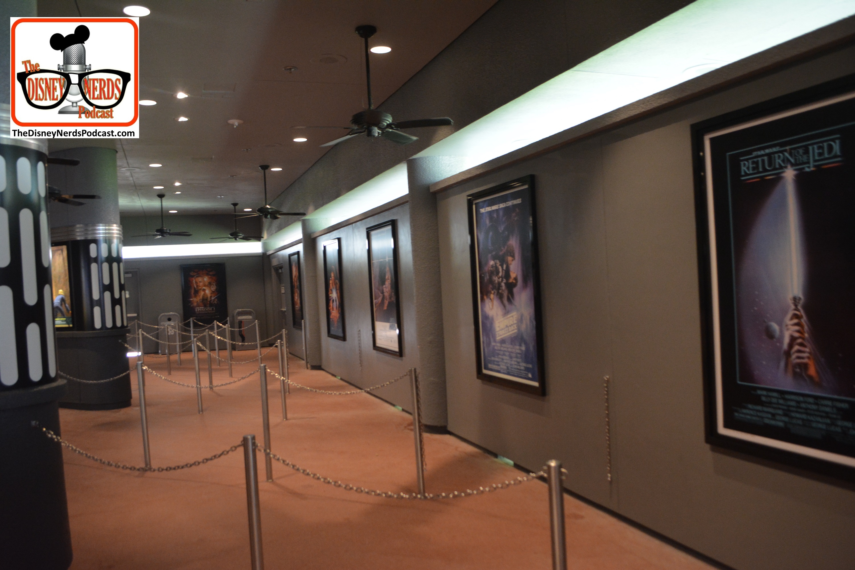 2015-12 - Hollywood Studios -Star Wars Posters cover the queue.