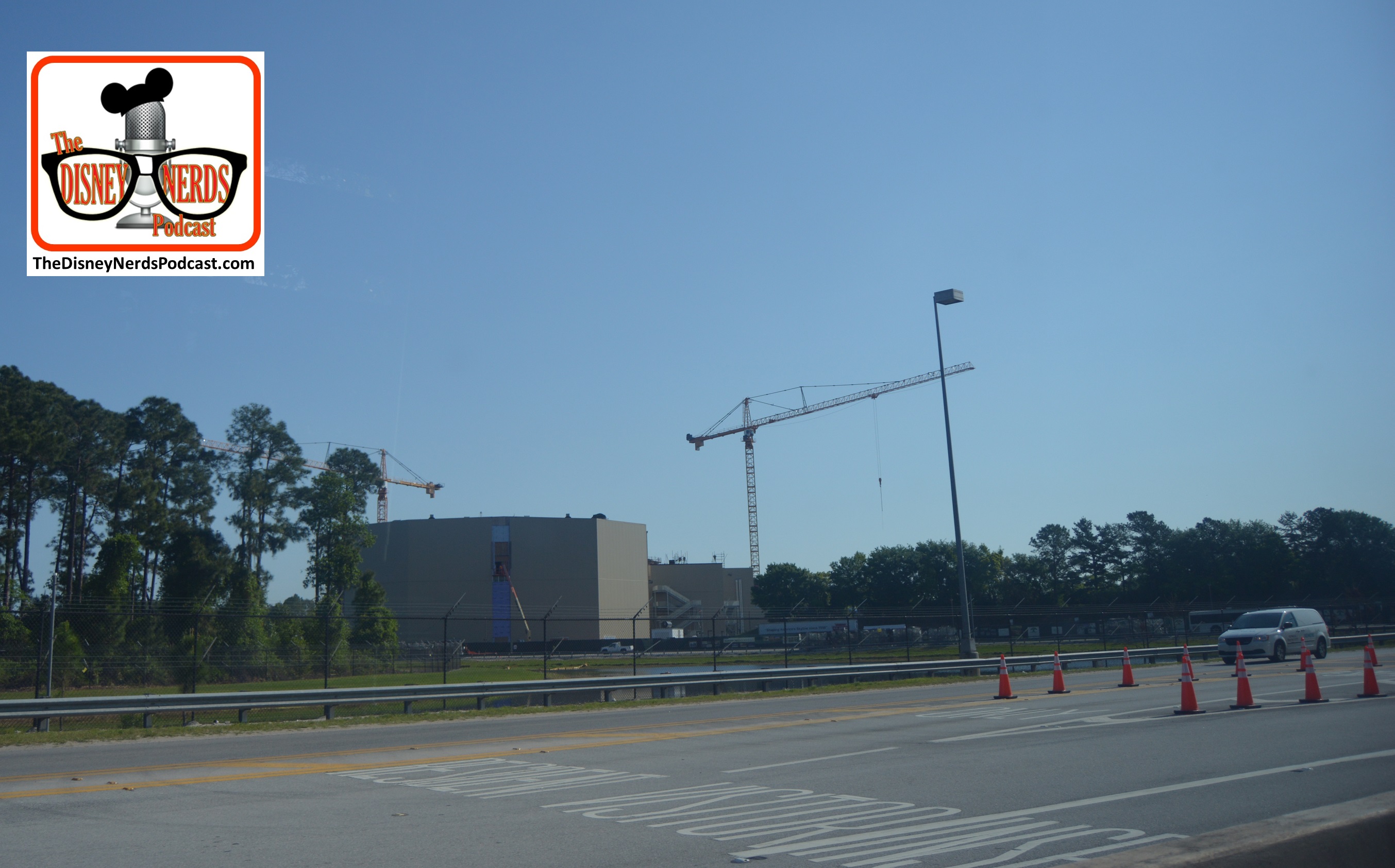 DNP April 2016 Photo Report: Animal Kingdom: Construction of Avatar land continues - This building is HUGE! look at how small the pick up truck looks at the bottom (Zoom in)