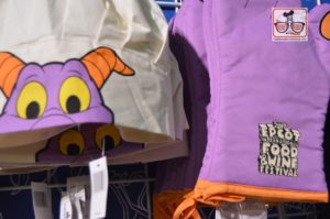 More Merchandise inside the Festival Center - Figment Chiefs Hat and "School House Rock" logo gloves.