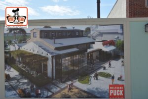 Wolfgang Puck Bar & Grill construction concept art - the building to the right is the World of Coke