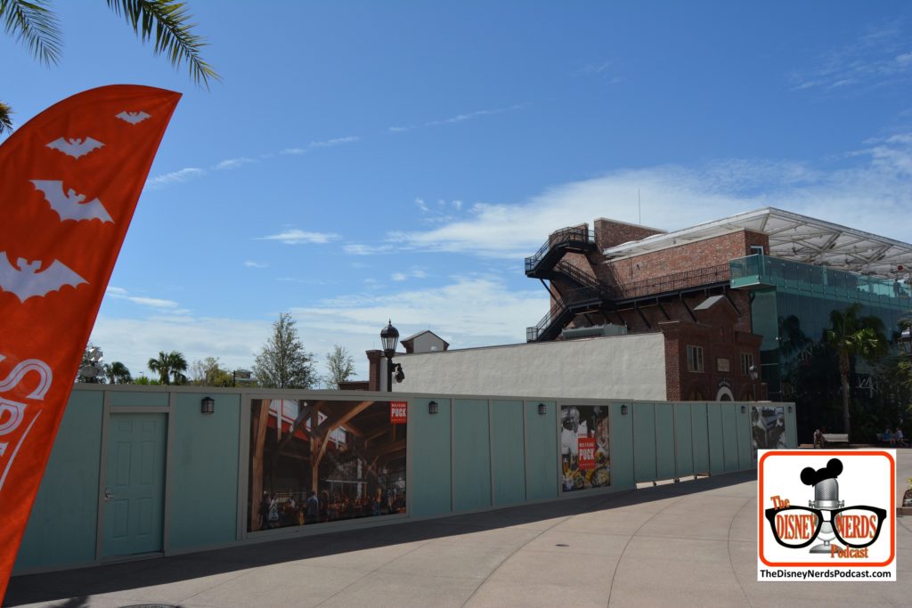 Wolfgang Puck Bar & Grill construction concept art - the building to the right is the World of Coke