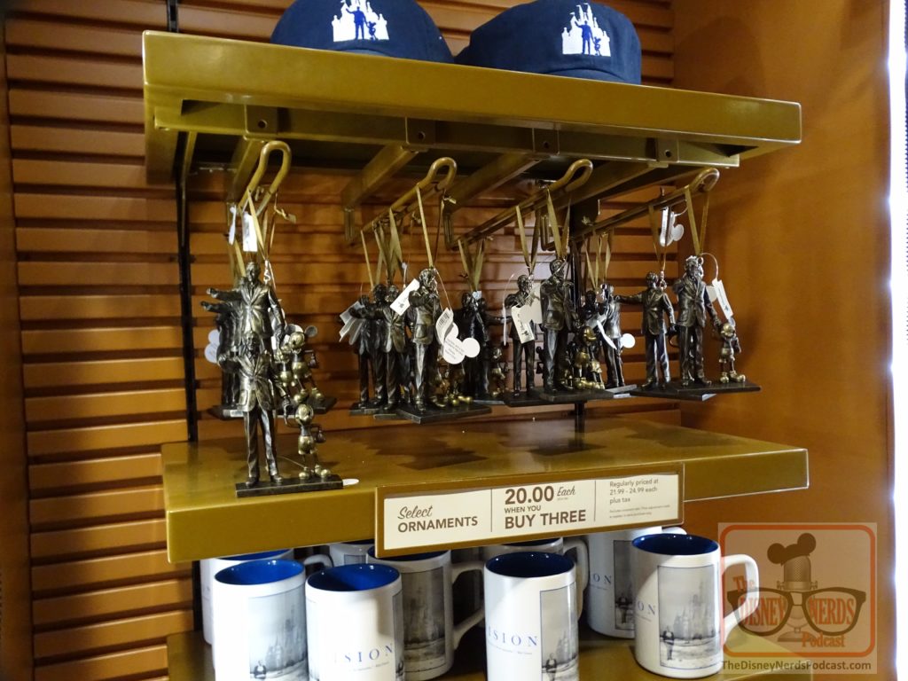 Stop by Walt Disney Presents to find partner statue Christmas ornaments in the far back store. The second row of hats for sale that were removed last week apparently  made way for these favorite Disney ornament collectibles. Get one or more for your family Christmas tree next park visit!