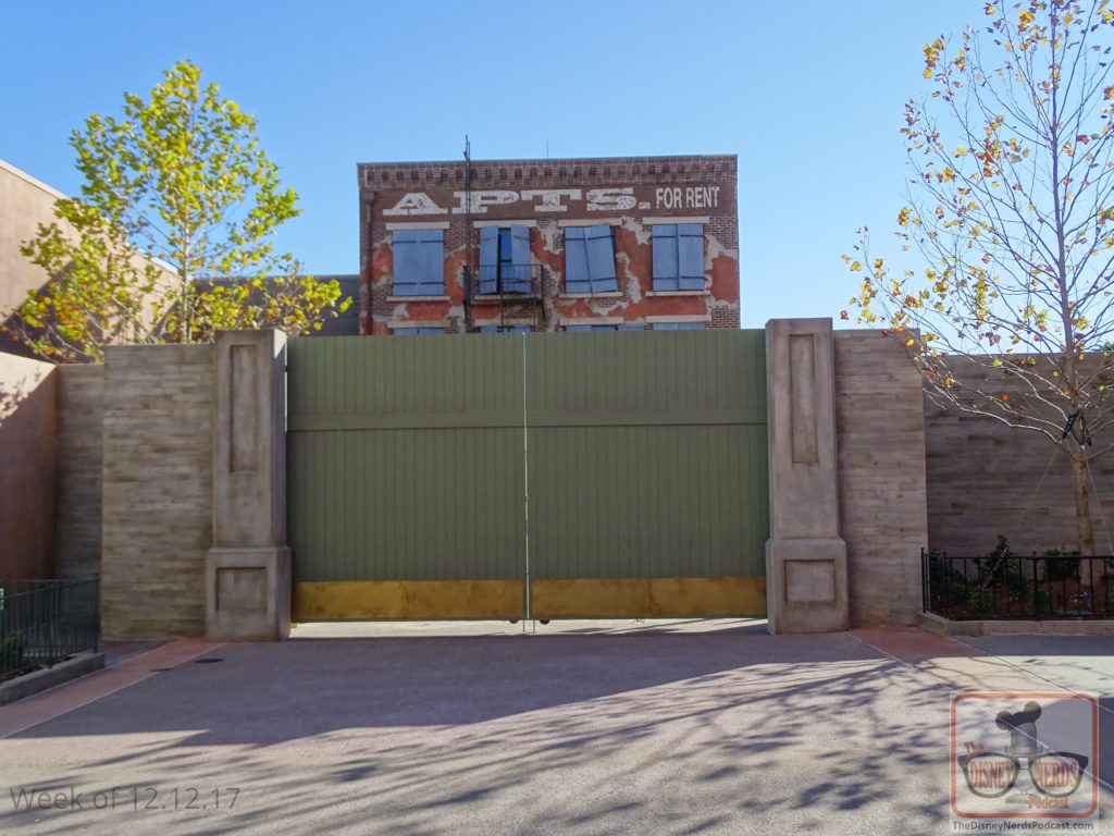 To begin, that blue construction wall in front of the big gate at the end of Muppet Vision we have been closely watching is now gone. Trees now surround the gate with one perfectly planted in front of the construction of Battu.