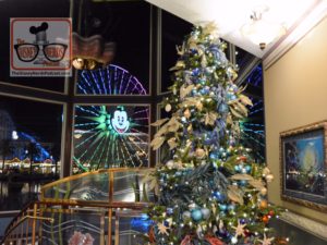 Christmas Tree inside Ariels Grotto with Mickey's Fun Wheel in the window