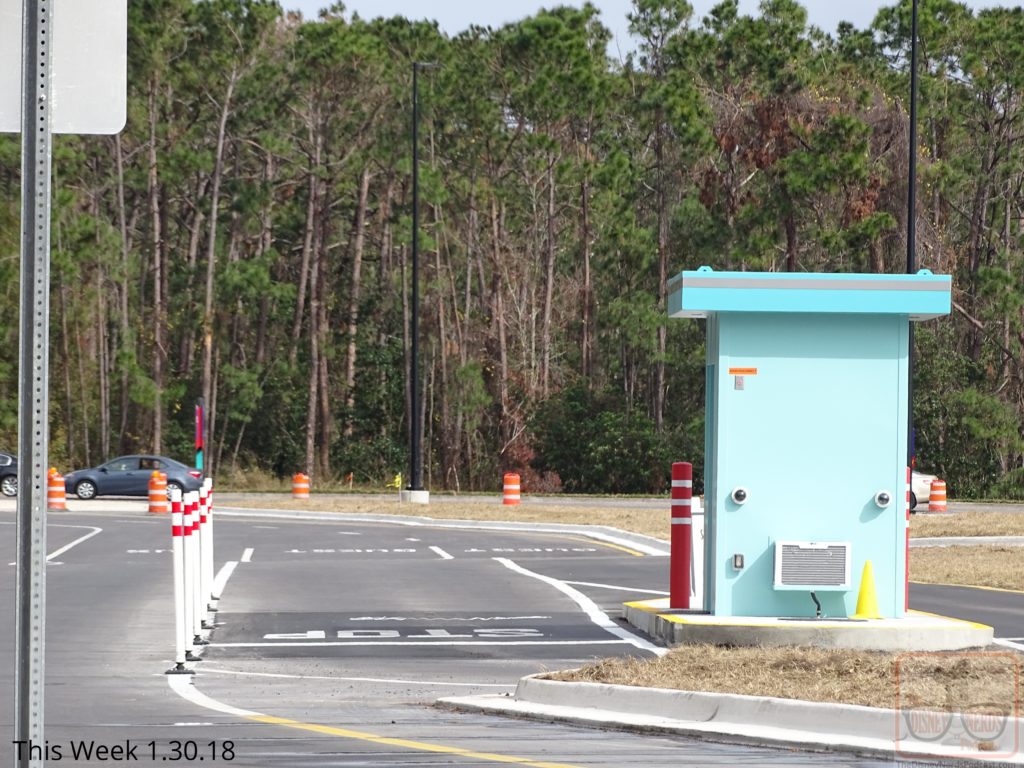 A new traffic pattern awaits arriving Studio guests. The main entrance recently paved vehicle lanes are now being utilized for visitor vehicles and Disney resort busses to enter the Park off of Lake Buena Vista Drive, including a new attendant booth for cast members to collect parking fees. The former two lane parking booth may soon disappear as have already many trees that formerly lined the north lot perimeter. Guests departing their parked cars on this near end of the lot can now catch a clear glimpse of the Morocco Pavilion and Spaceship Earth over in Epcot as they head for the Studio’s main entrance. The ever popular Speedway gas station across the street is even visible now due to the tree clearing efforts.